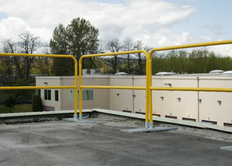 Temporary guardrail systems for construction